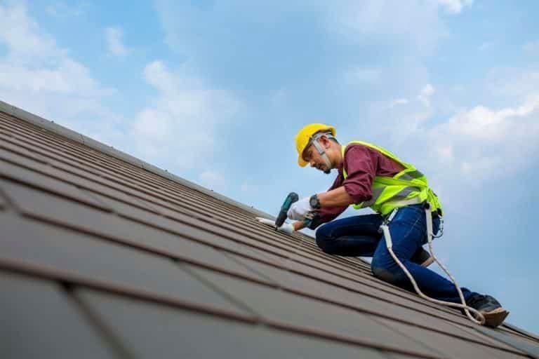 Roofer on roof