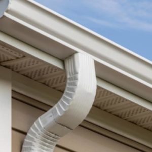 A close view of a gutter installed in a house.