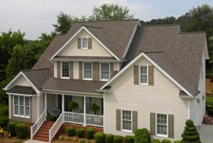 a new asphalt shingle roof on a large home