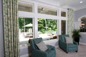 wood-clad windows in a comfy living room